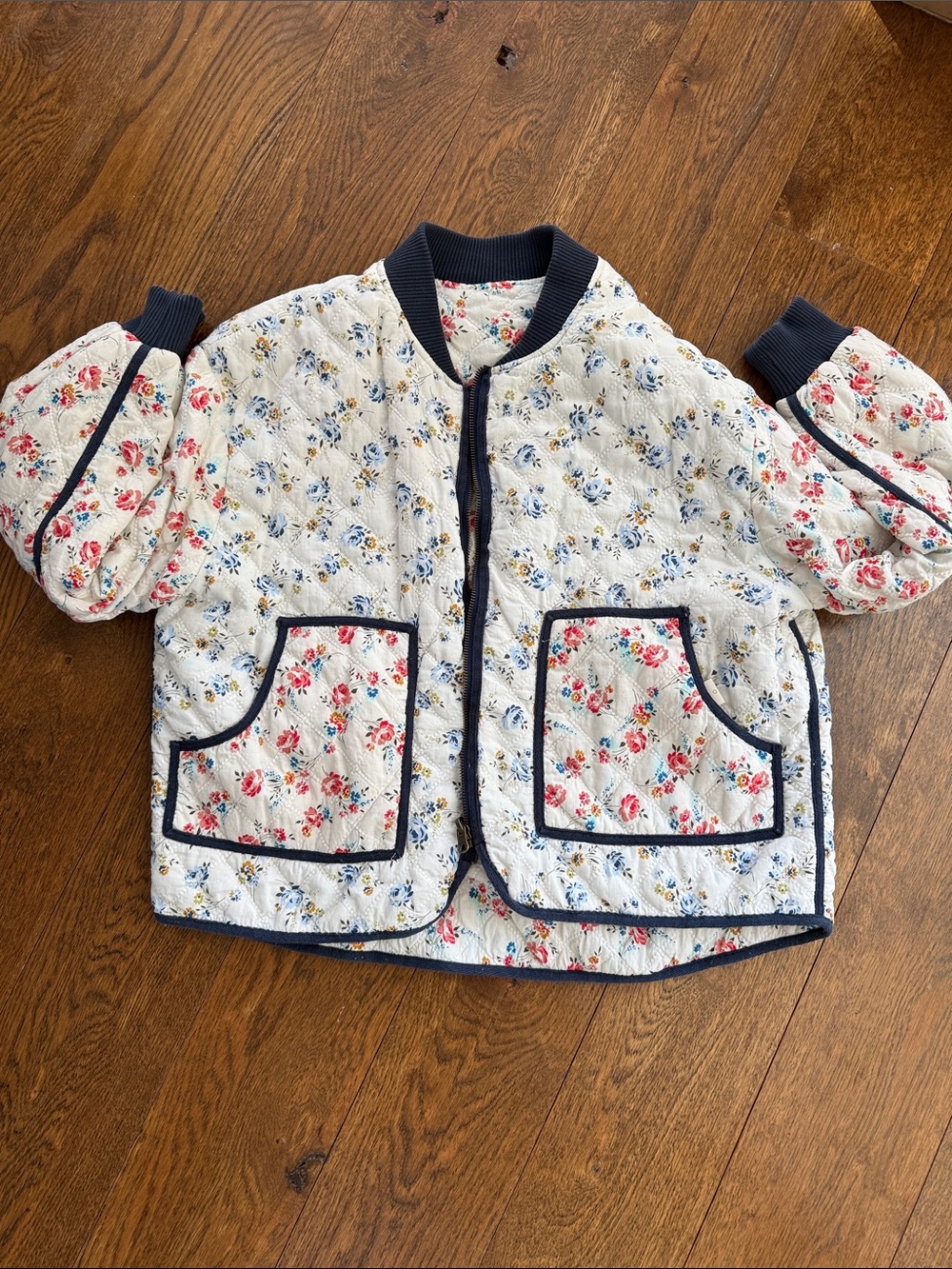 THE GREAT. Quilted Floral Puffer Jacket in Cream with Navy Trim